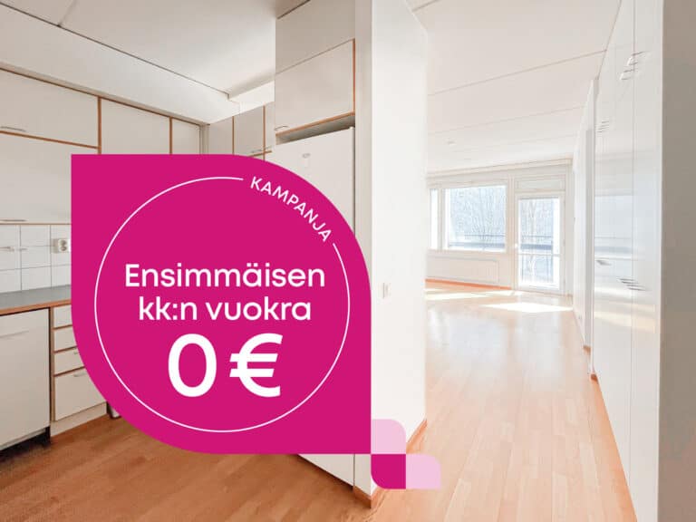 Valoisa, tyhjä asunto, jossa on puulattiat ja valkoiset seinät. Vaaleanpunaisessa pyöreässä banderollissa lukee ”Kampanja. Ensimmäisen kuukauden vuokra 0 €”, mikä viittaa tarjoukseen, jossa ensimmäisen kuukauden vuokra on ilmainen.
