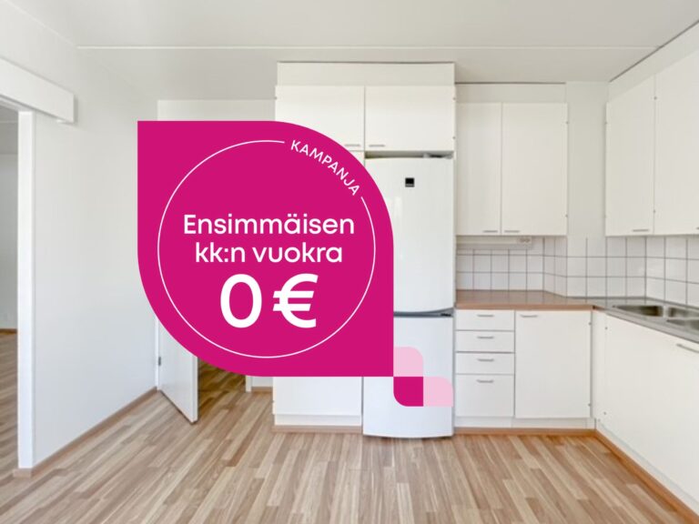 Valoisa keittiö, jossa on valkoiset kaapit ja mainosgrafiikka, jossa ilmoitetaan, että ensimmäisen kuukauden vuokra on 0 euroa.