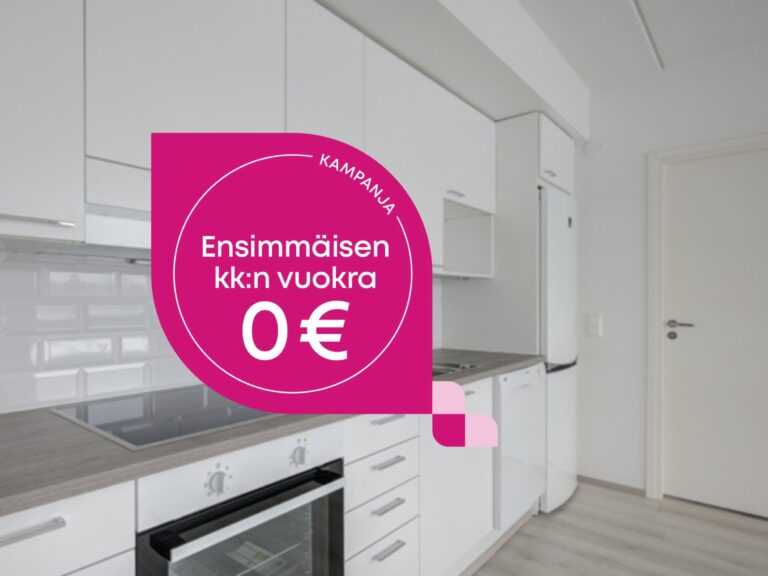 Keittiö, jossa on valkoiset kaapit ja vaaleanpunainen mainoskyltti, jossa lukee: KAMPANJA Ensimmäisen kuukauden vuokra 0 €.