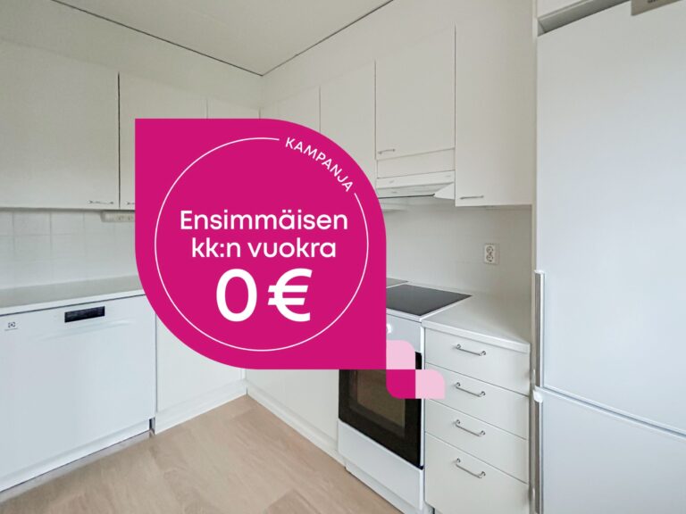 Valkoinen keittiön sisustus, jossa on kampanjatarra, jossa lukee: KAMPANJA. Ensimmäisen kuukauden vuokra 0 €.